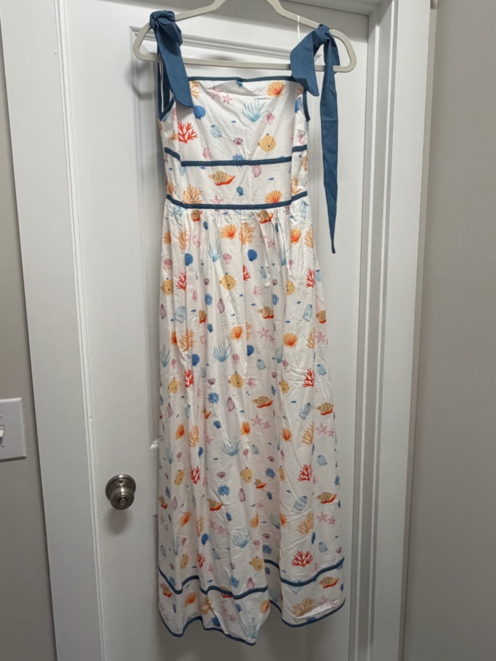 Davi & Dani White Smocked Dress with Multicolor Seashell Print and Blue Ties